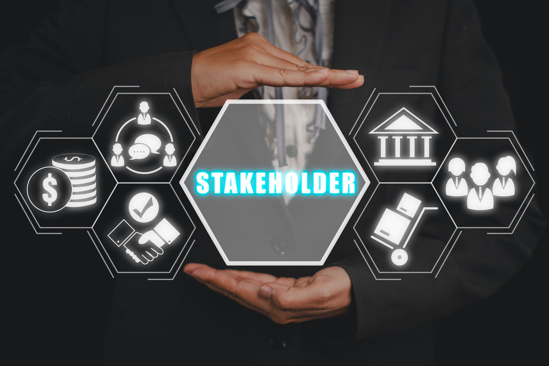 mmunityStakeholder concept, Business woman hand holding stakeholder icon on virtual screen.